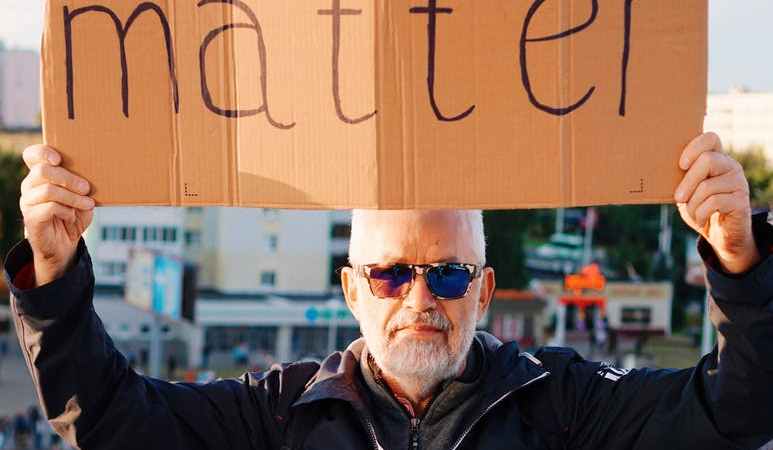 protester holding sign