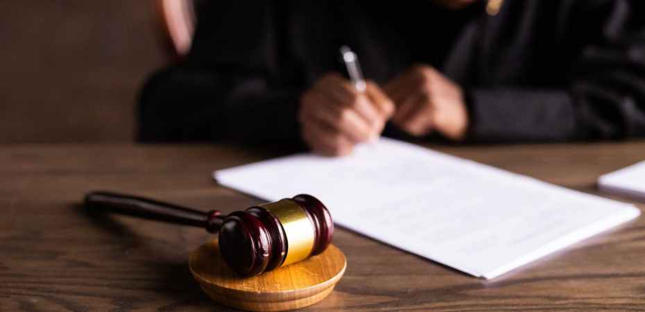 judge signing on the papers