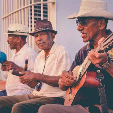 three men playing musical instruments